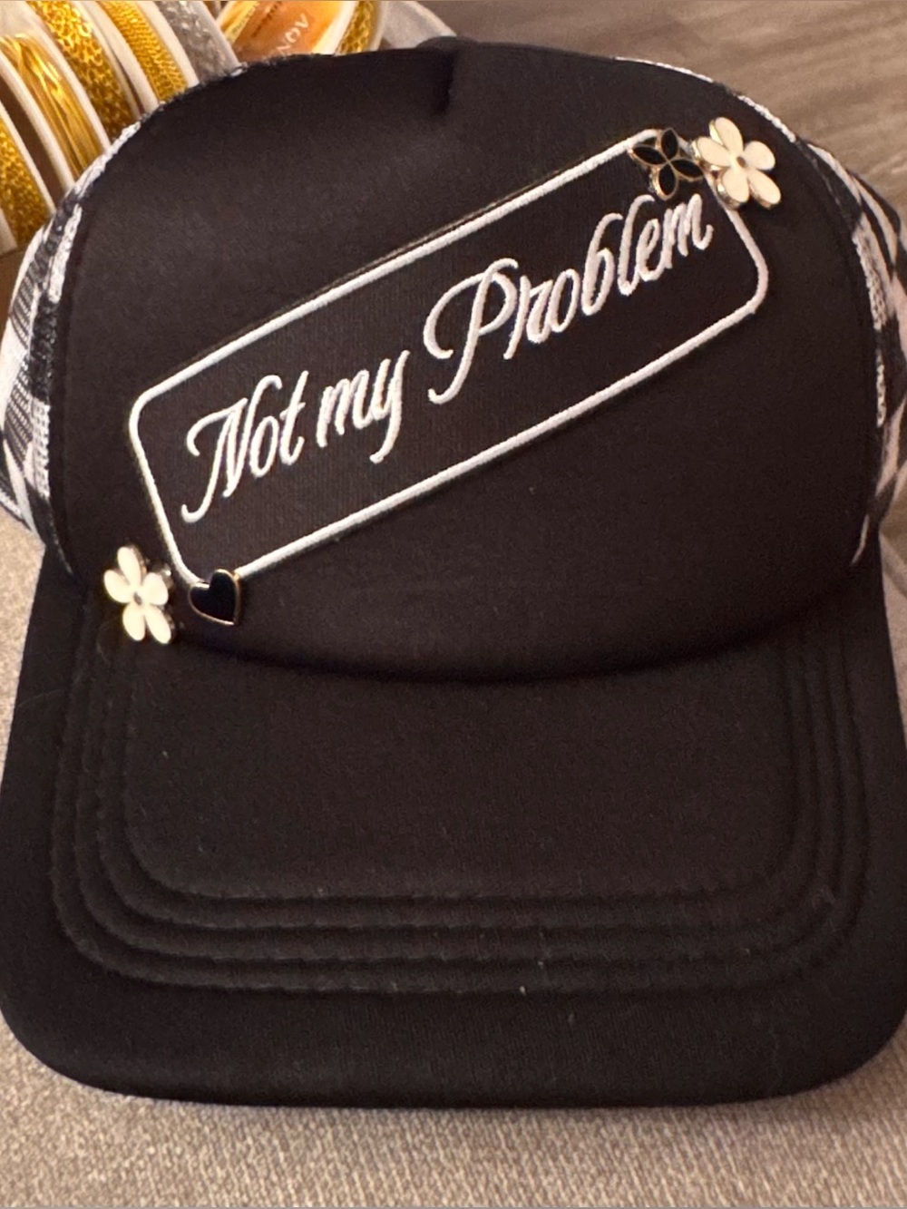 Black 'Not My Problem' Embroidered Trucker Hat